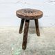 Carved wooden tripod stool
