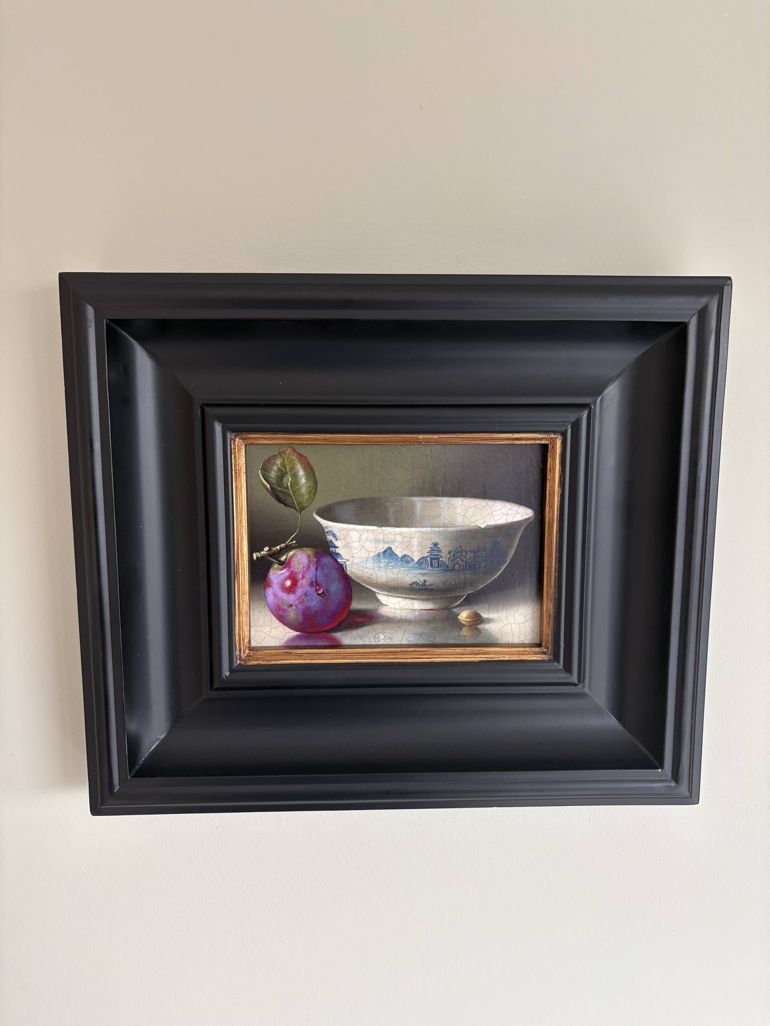 Beautiful still life with plum and bowl.