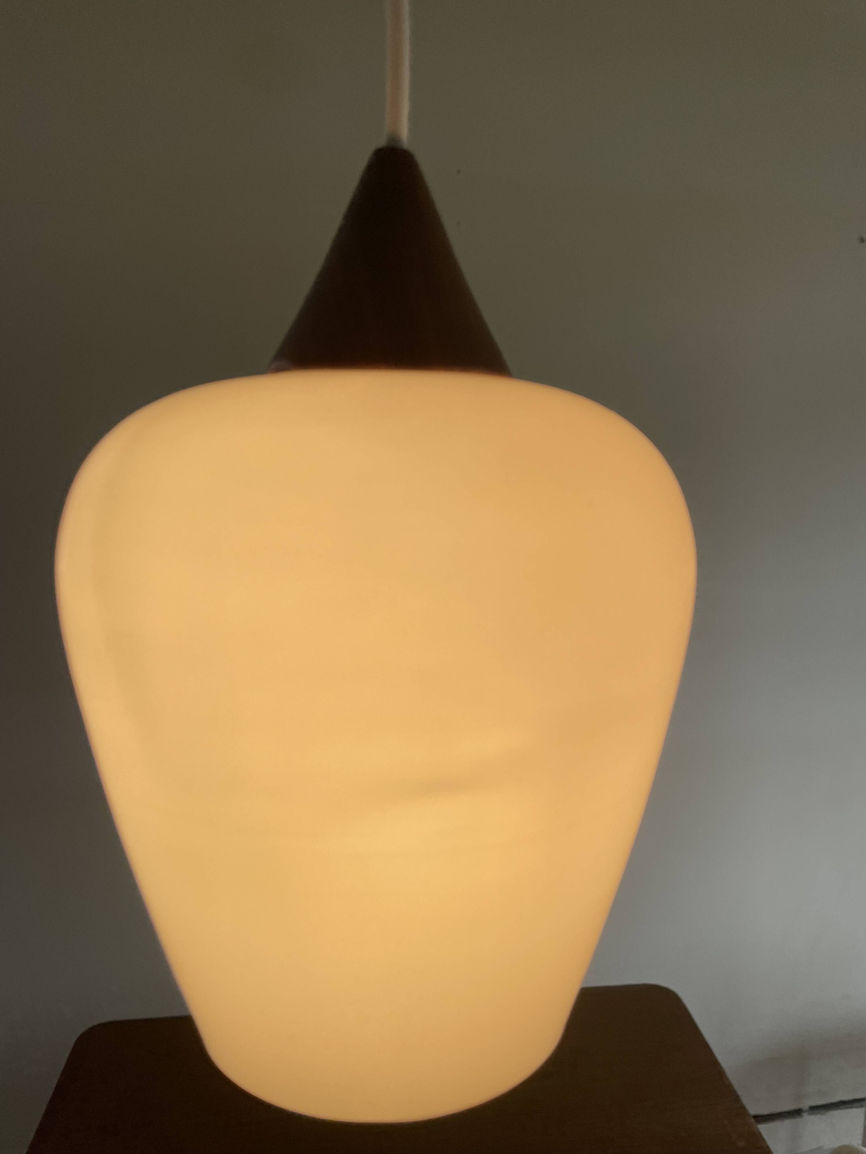 Danish teak and milk glass pendant lamp.