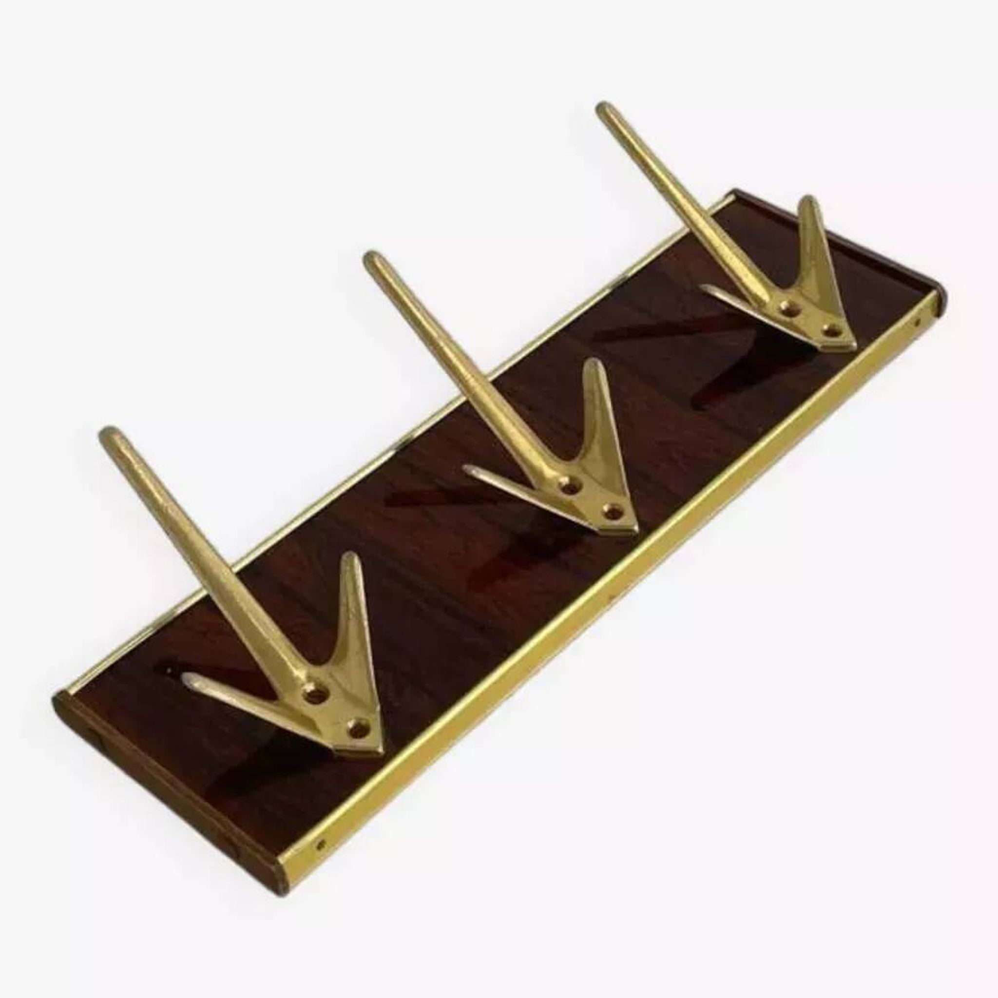 Coat rack or wall hook from the 1950s in wood and brass.