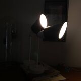 Pair of adjustable industrial metal wall sconces.