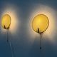 Pair of green plexiglass and gold metal wall lights by Erco, 1950s, Germany.