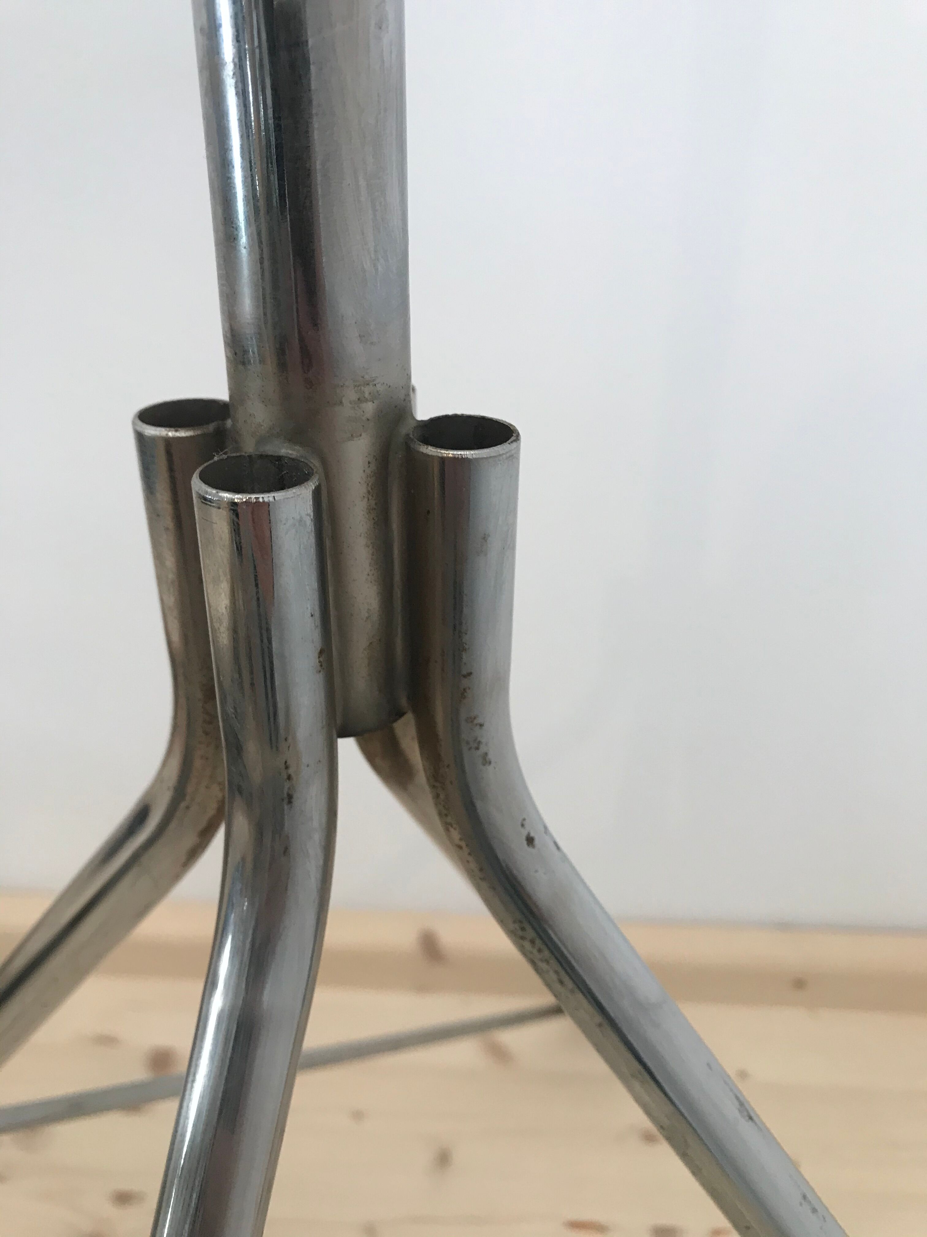 Wearing chrome parrot coat, black and multicolored balls