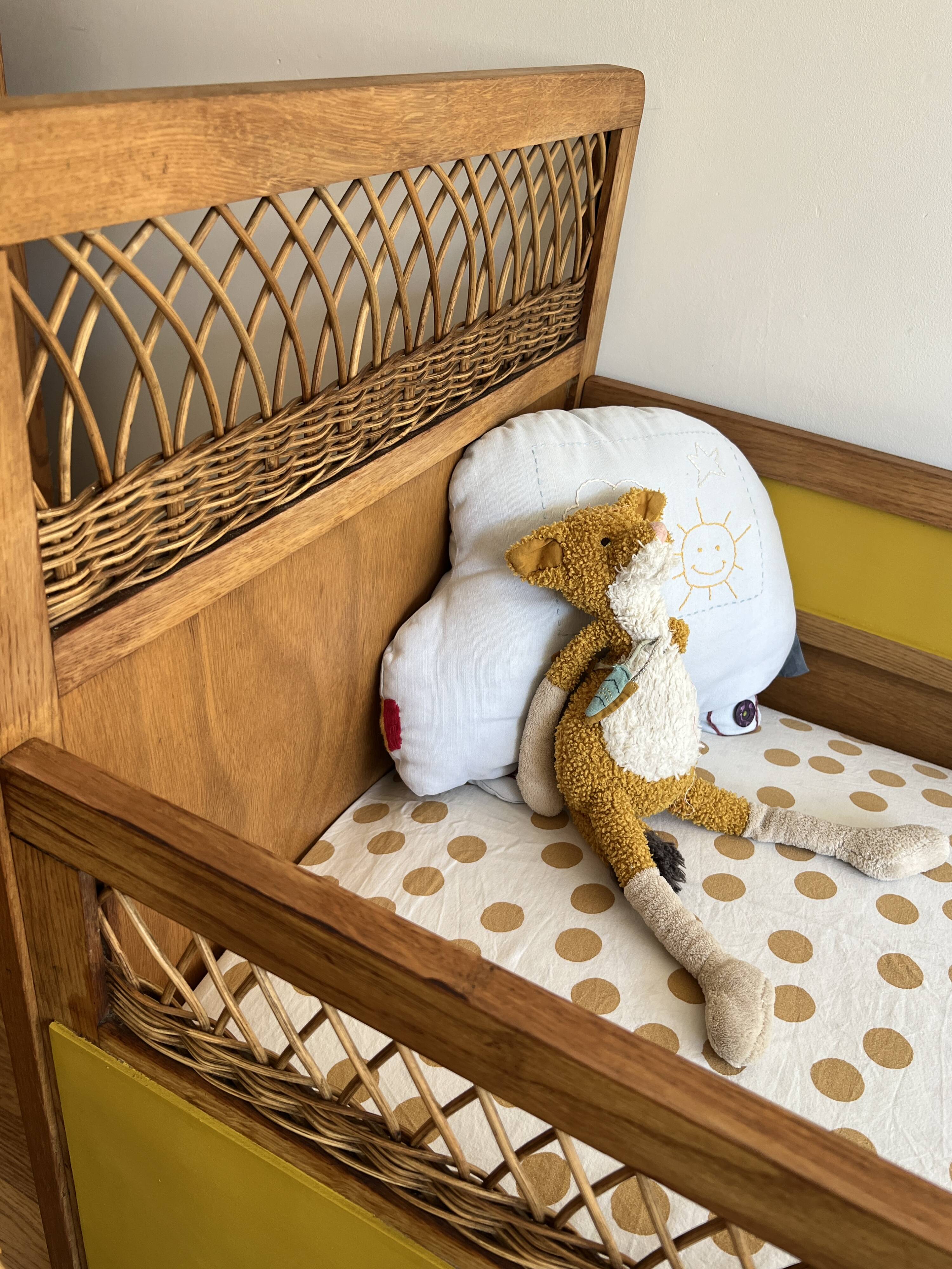 Vintage rattan and wood baby bed
