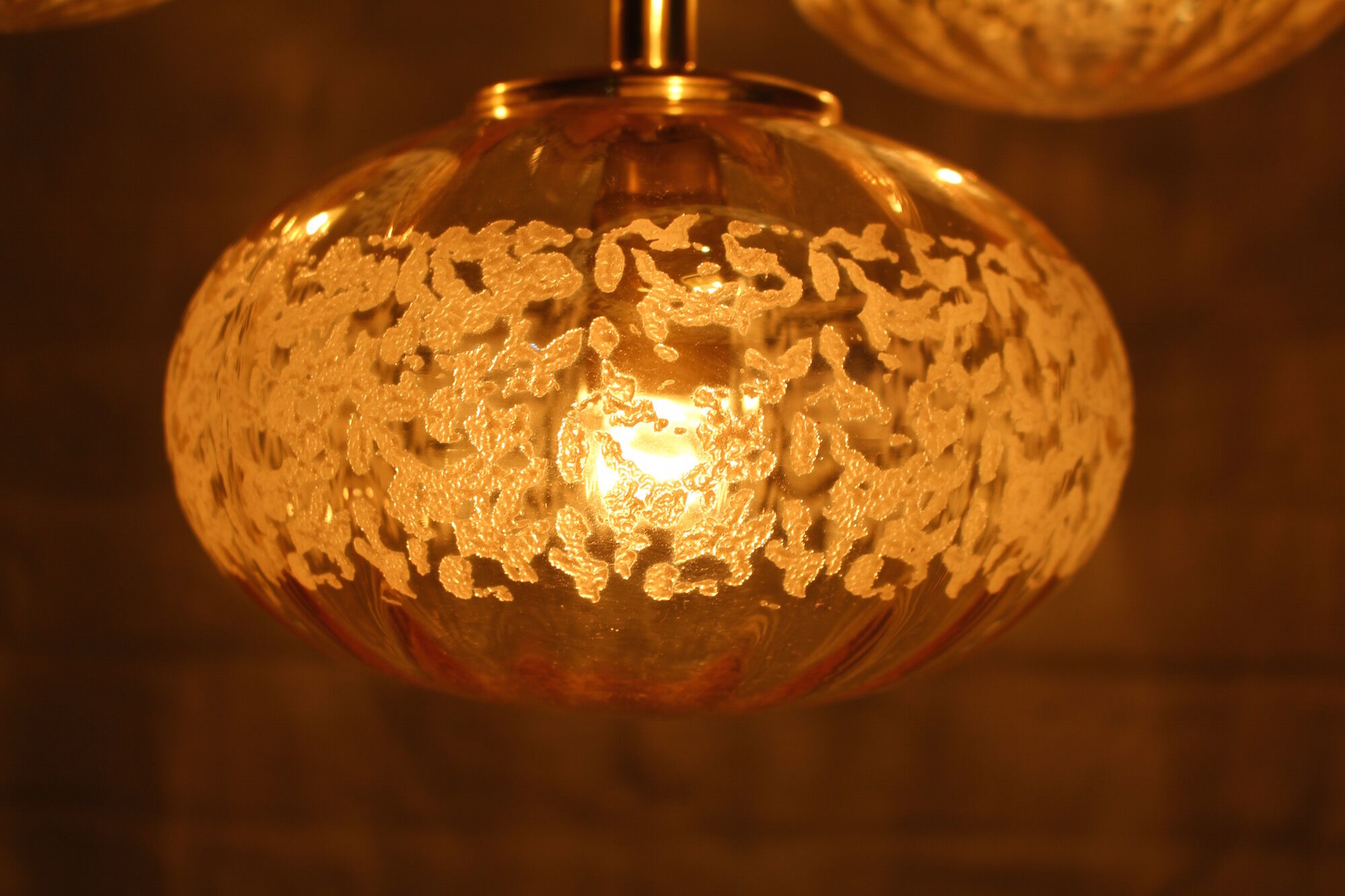 Cascade chandelier 4 globe in blown amber glass