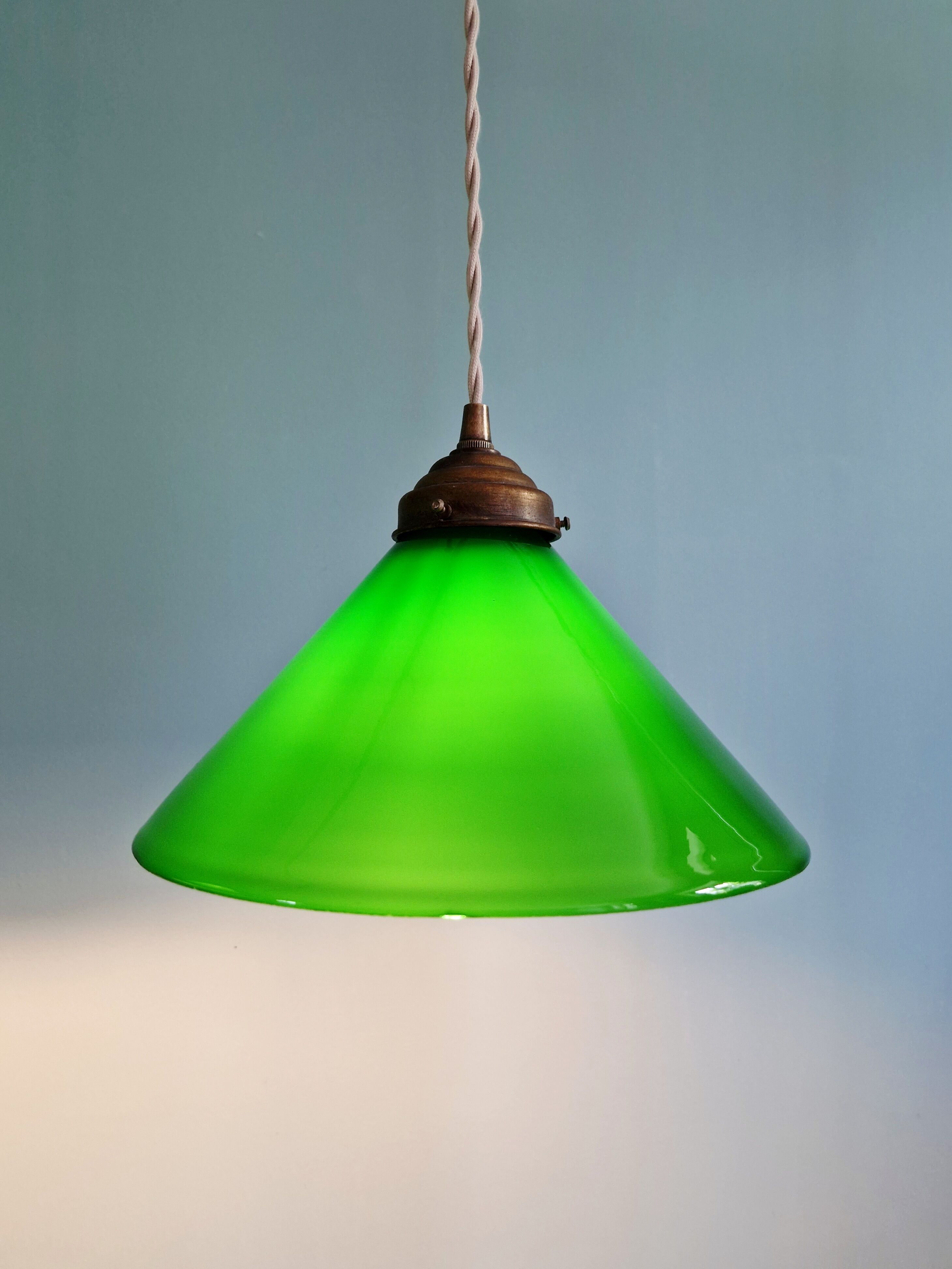 Pair of conical green opaline pendant lights, Art Deco style