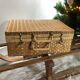 Vintage woven wicker suitcase