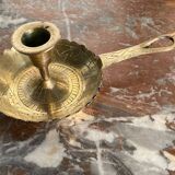 Brass hand candle holder with Egyptian decorations