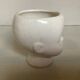 Cache pot vase en forme de poupon bébé