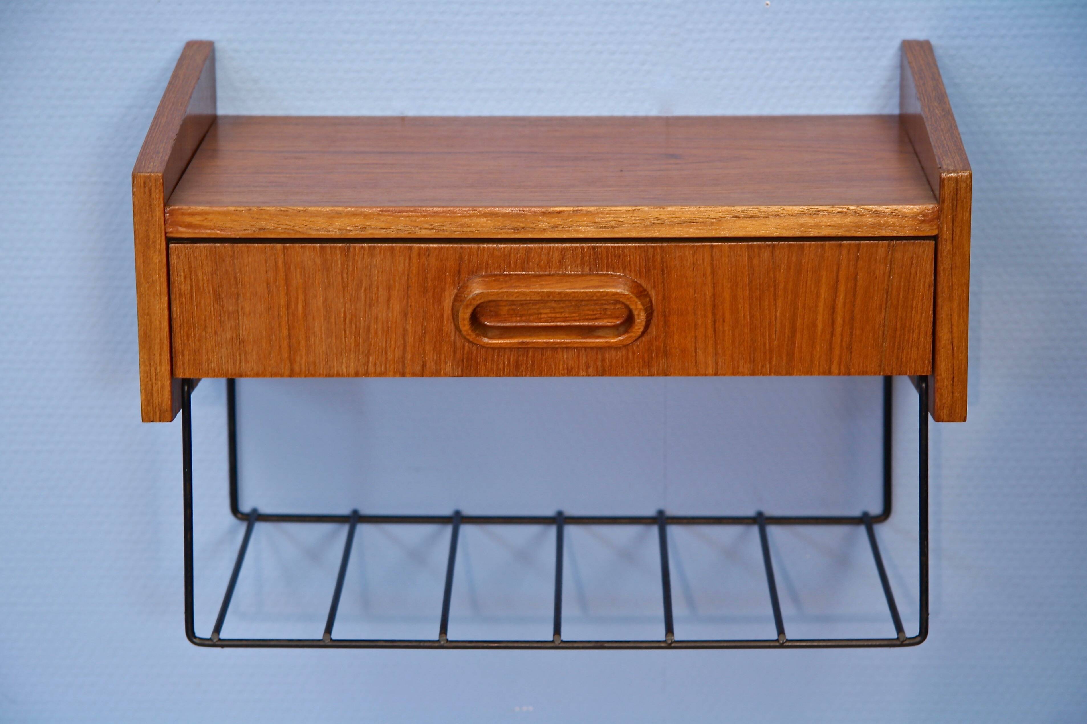 Dutch wall shelf by Tomado in teak and metal, 1960s.