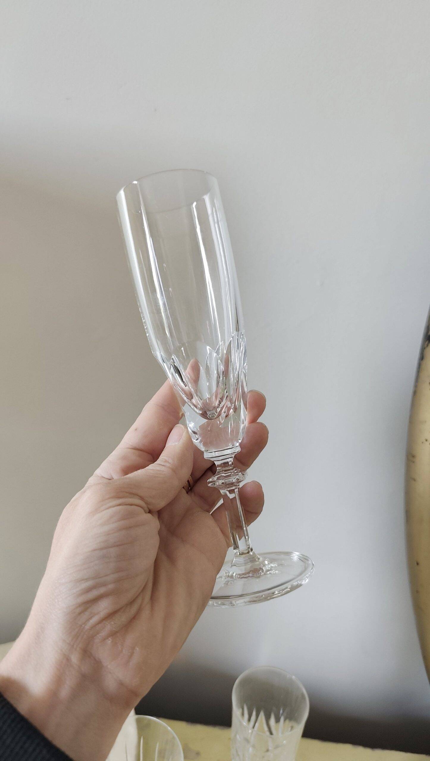 Mismatched set of prestigious crystal champagne flutes