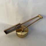 Brass articulated sconce