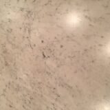Table marble year 50 chrome foot