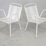 Pair of honeycomb steel armchairs. France, circa 1950.