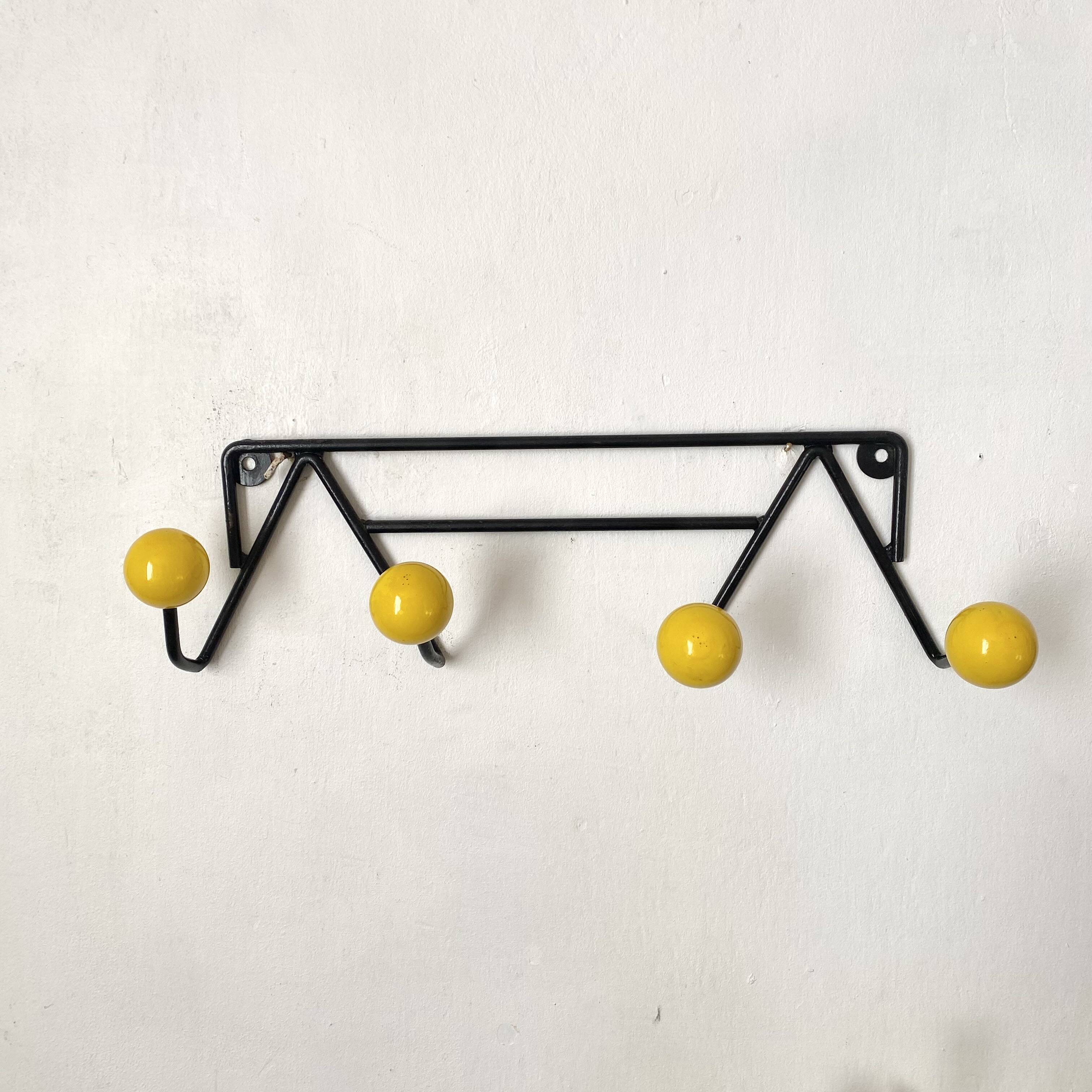 Vintage coat rack with ball hooks in Feraud style.