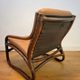 Vintage rattan armchair with leather cushions from 1970