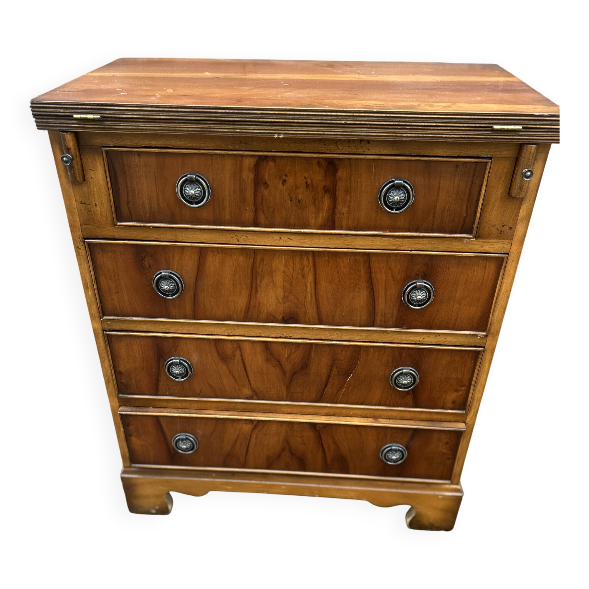Small English chest of drawers with a folding top.