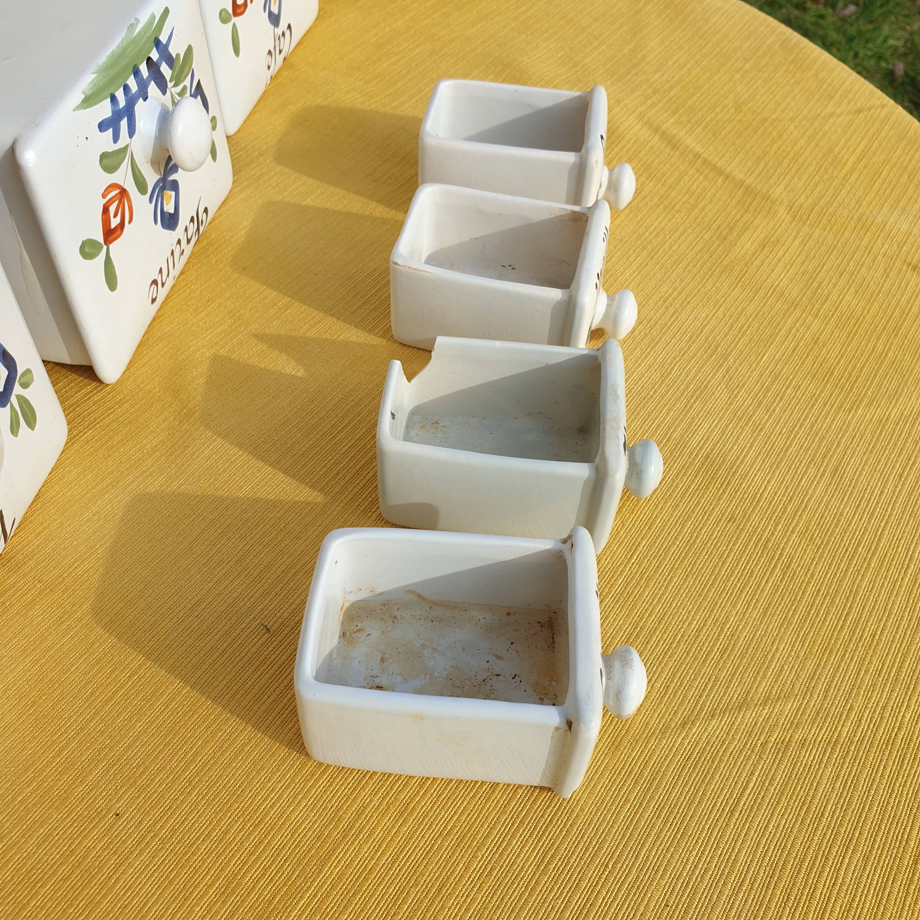 Vintage wooden spice rack with ceramic drawers
