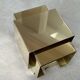 Cubical brass wall light