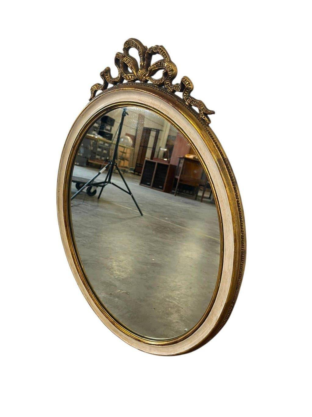 Miroir mural ovale baroque vintage à décor de noeud