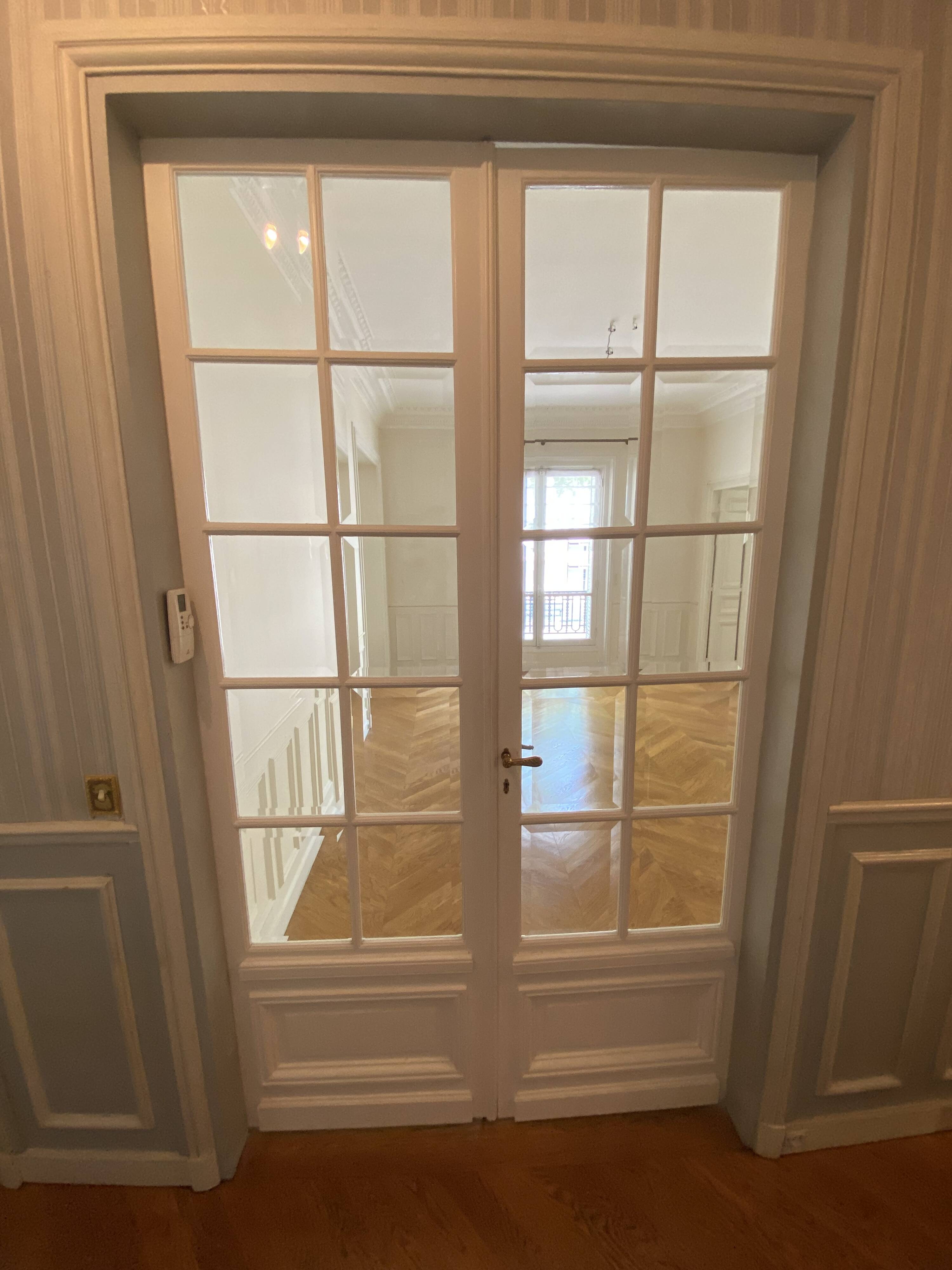 Grande double porte haussmannienne vitrée, Paris fin XIXe siècle