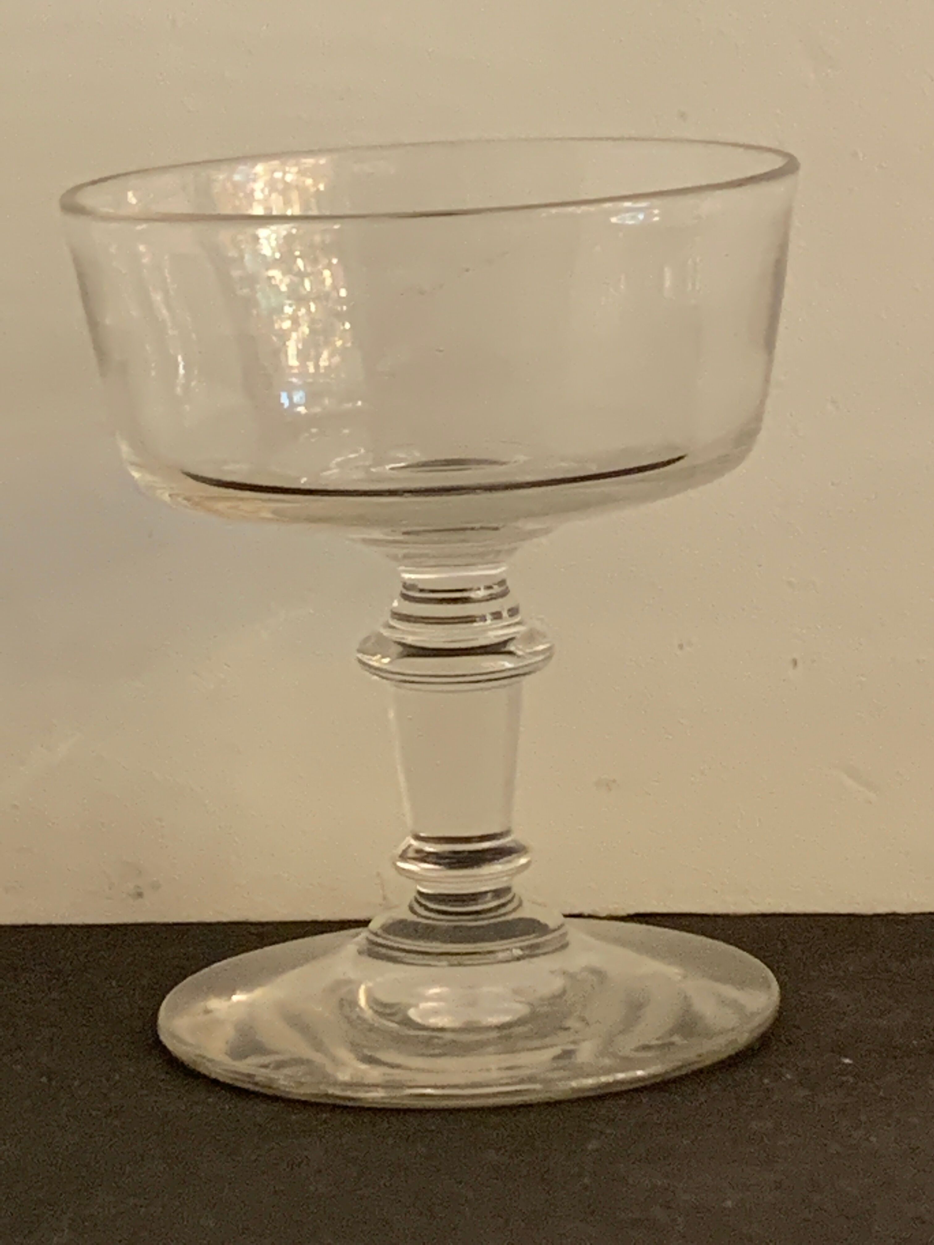 3 old champagne cups in blown and bubbled glass