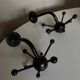 Pair of black space age sputnik coat racks