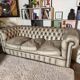 Three-seater Chesterfield canapé in patinated leather, custom-made by Chesterfields1780.