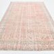 Tapis vintage à décor floral rouge et beige