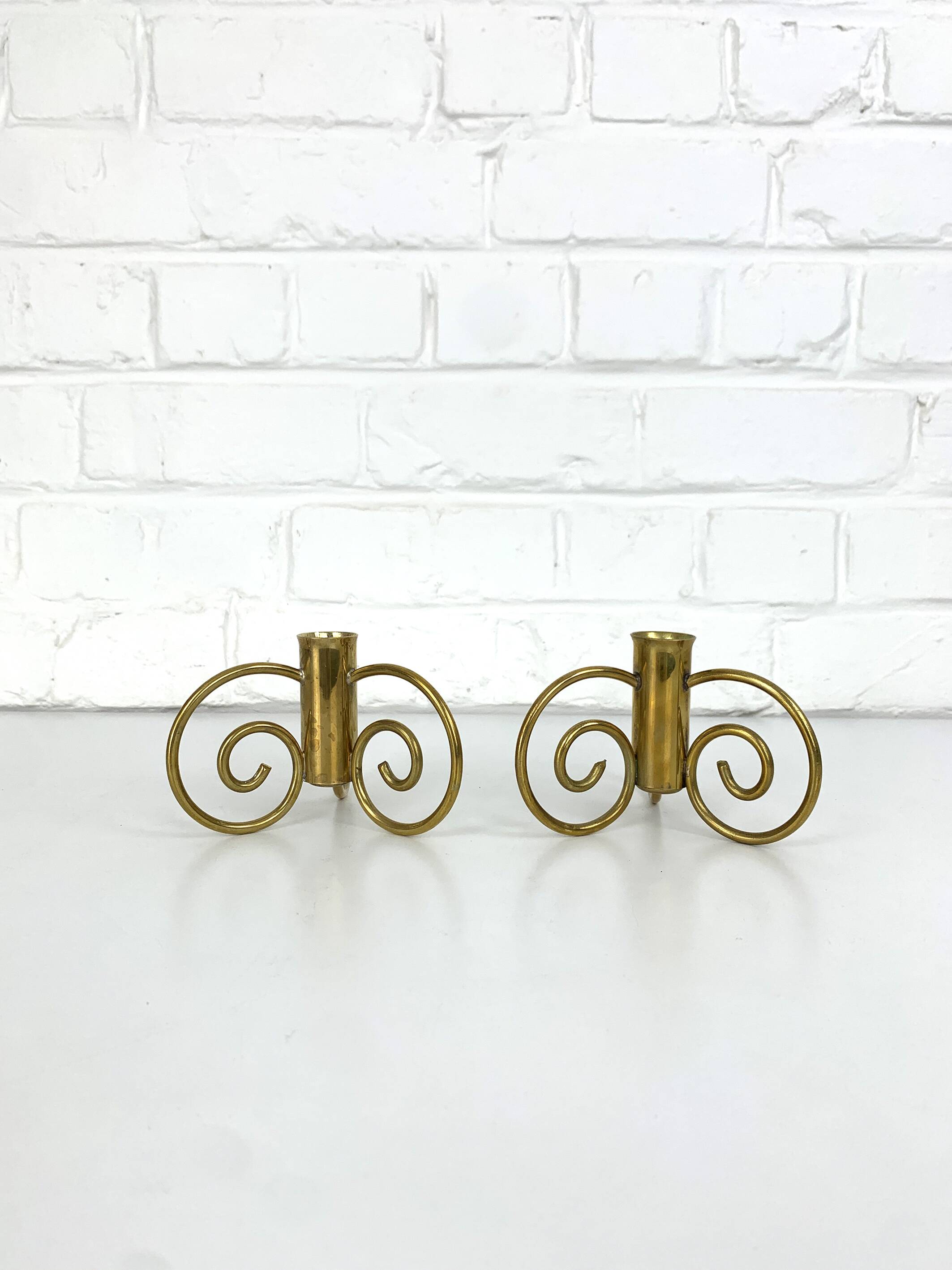 Pair of brass candlesticks, Lars Holmström for Svenskt Tenn, Sweden, 1950