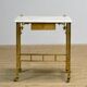 Small brass table with marble top, circa 1910