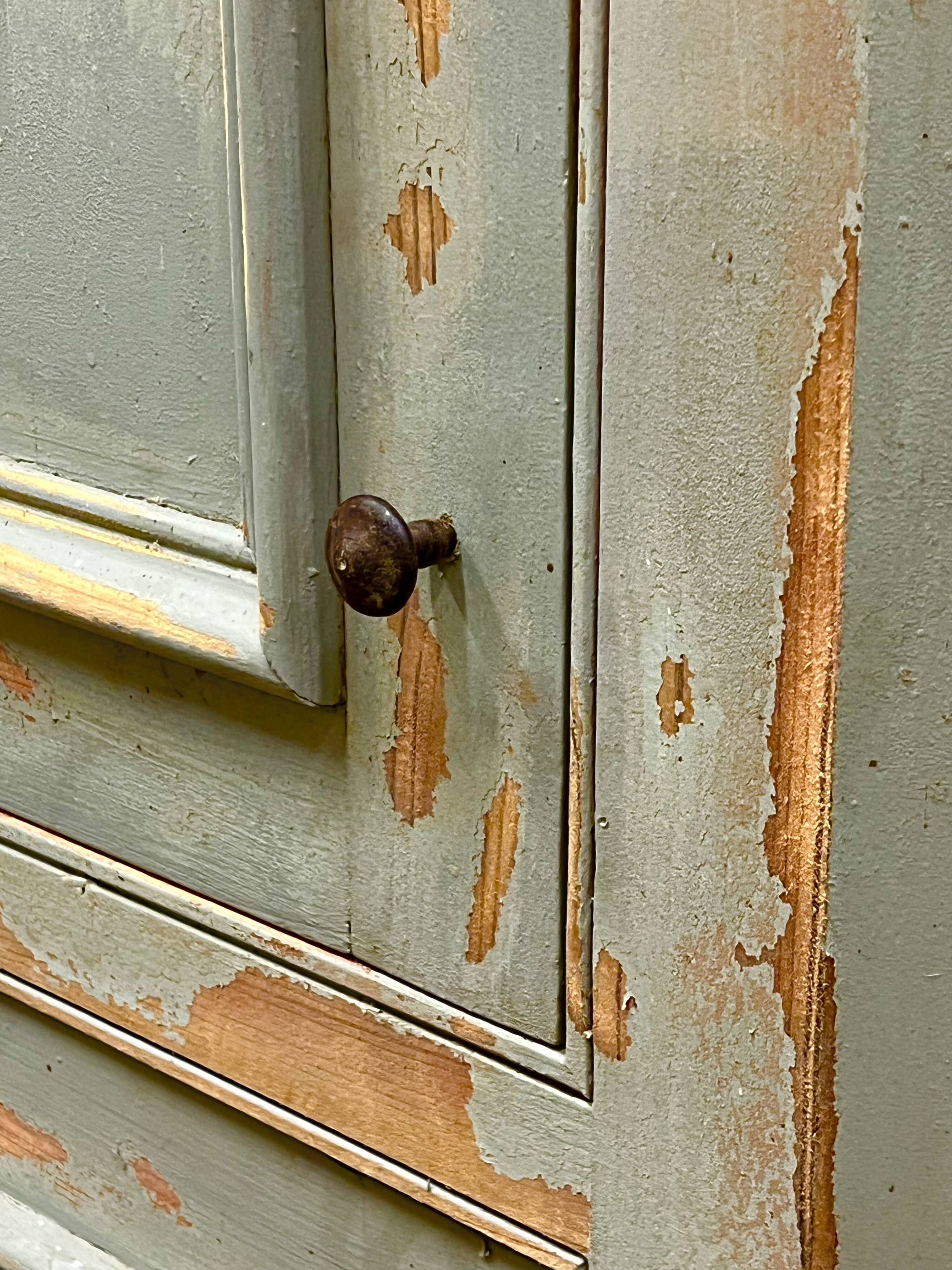 Patinated corner cupboard