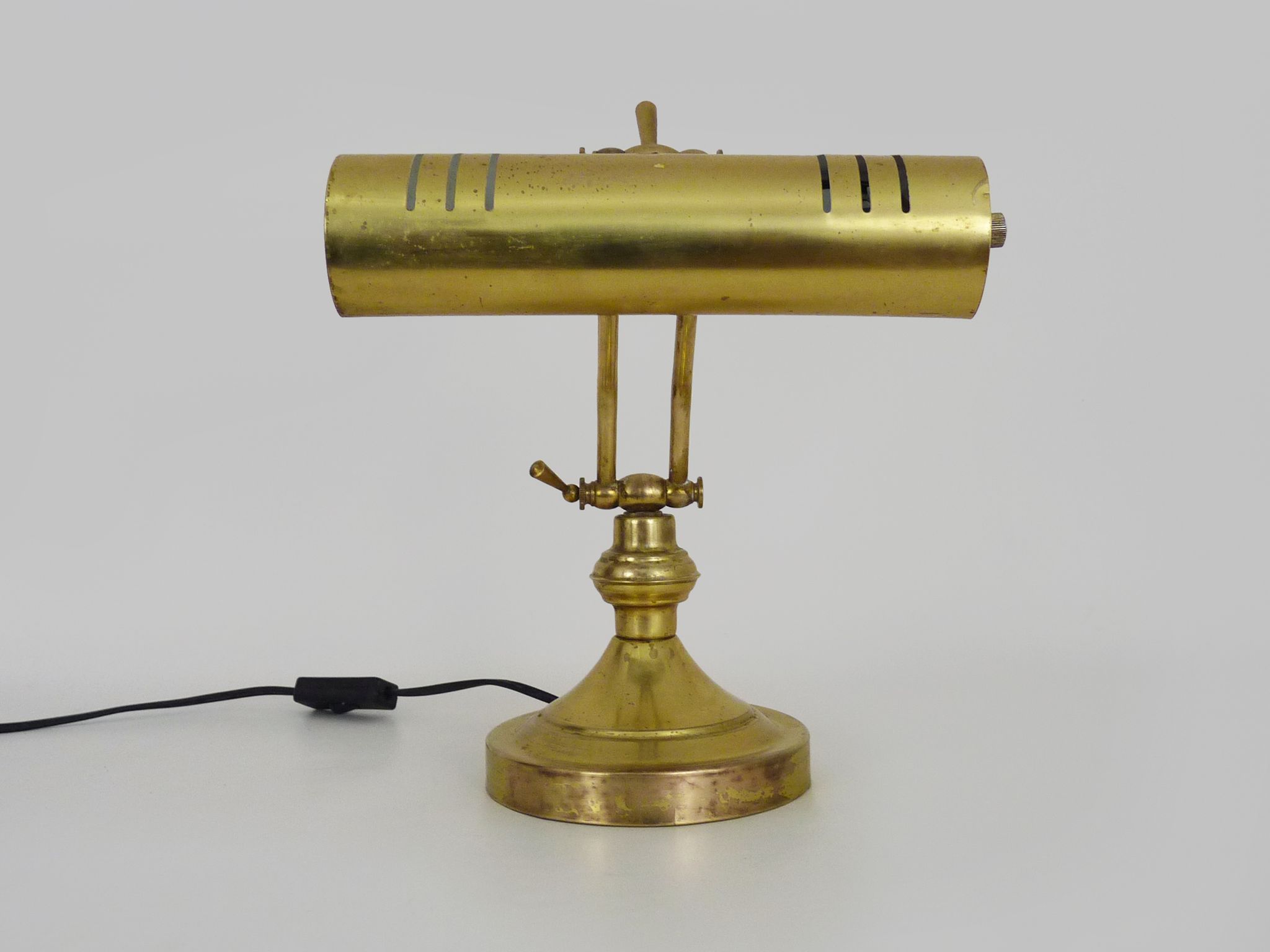 Old articulated piano lamp