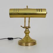 Old articulated piano lamp