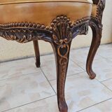 Fauteuil de bureau louis xv, sculpté, canné, garni cuir