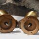 Paire d'appliques en bois et métal doré
