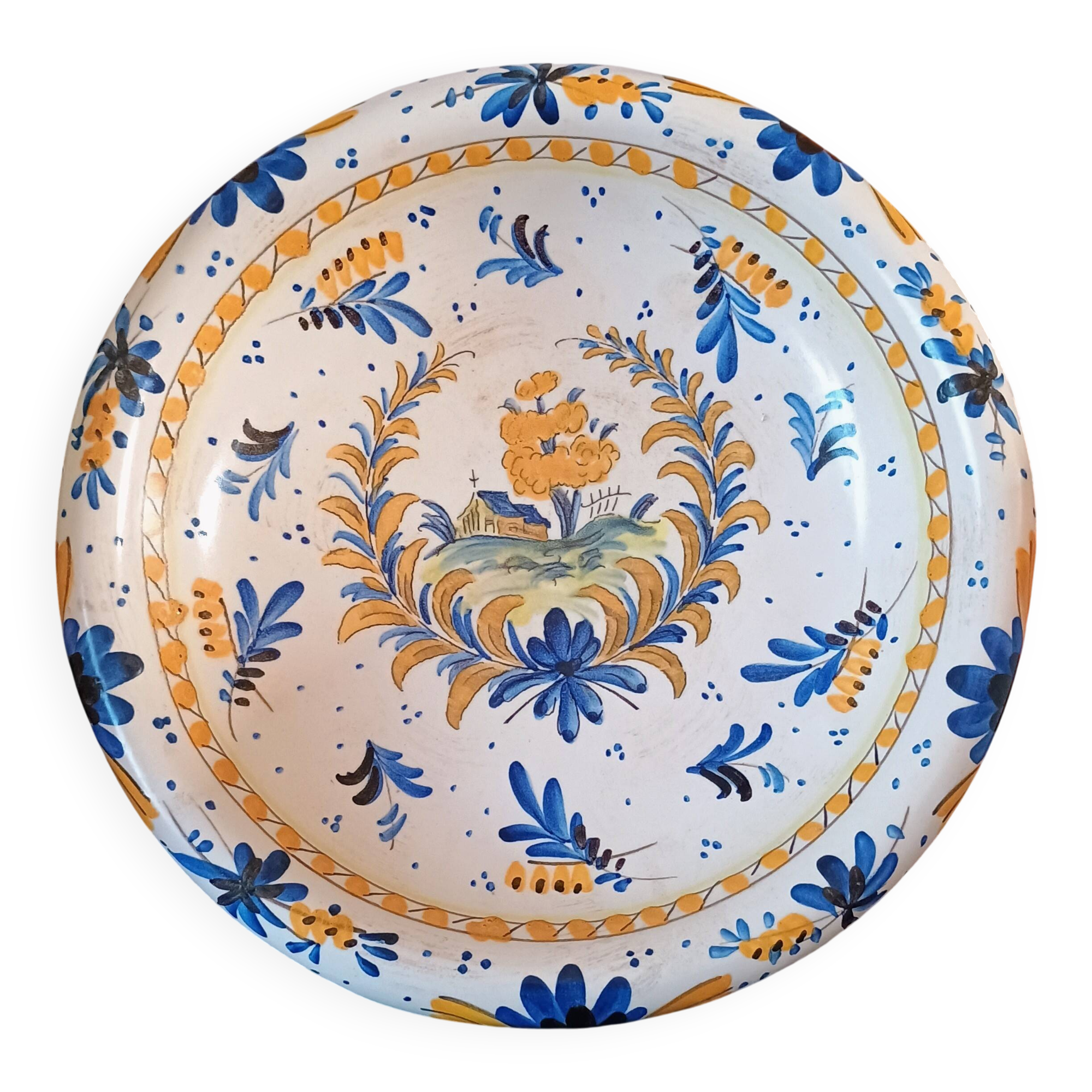 Large earthenware bowl decorated in the Rouen/Moustiers style.