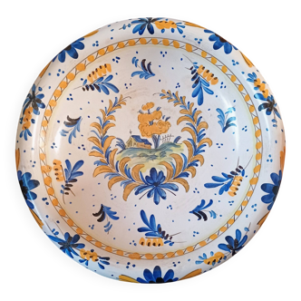 Large earthenware bowl decorated in the Rouen/Moustiers style.