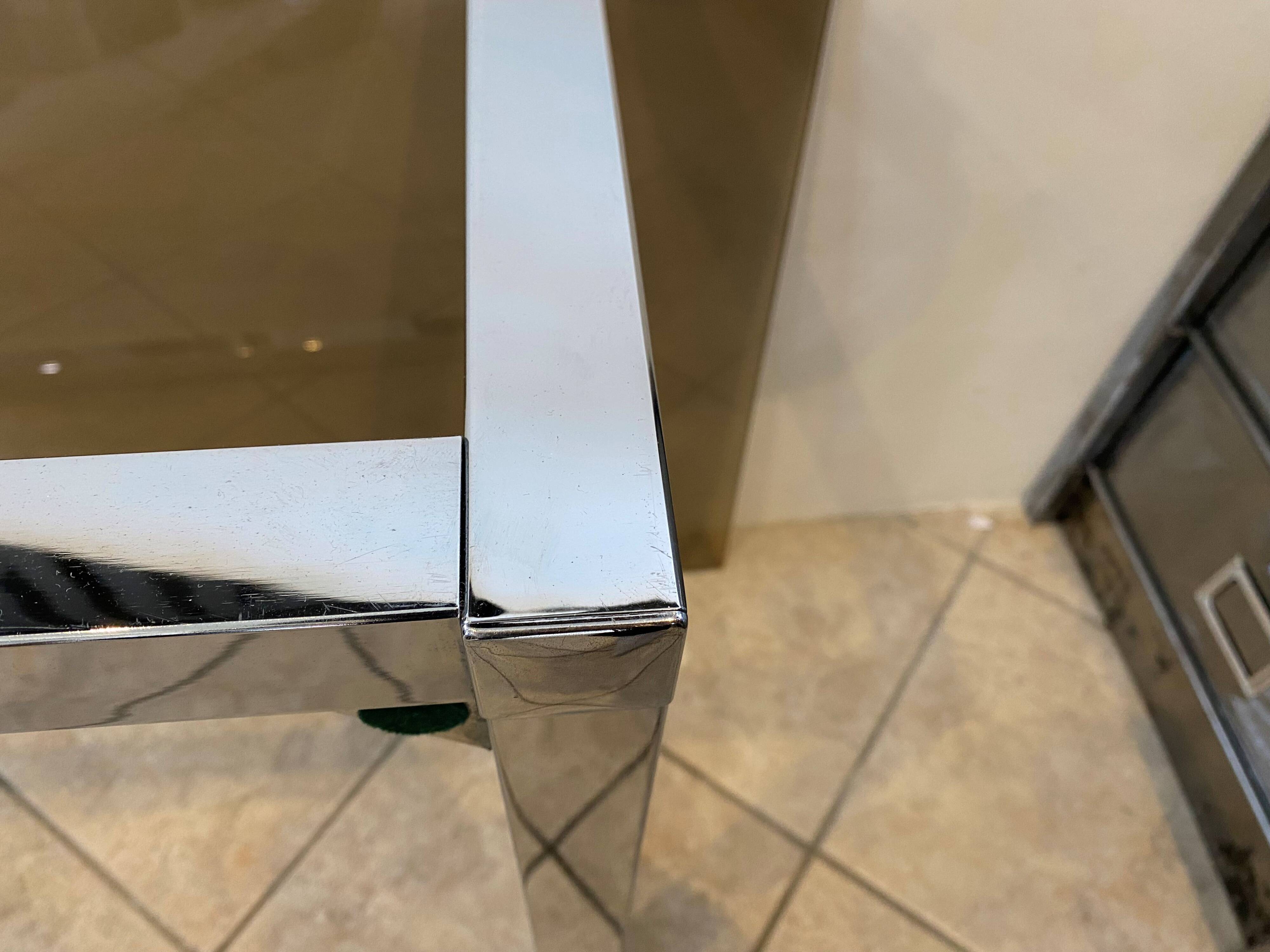 Square coffee table with smoked glass top and chrome base an70