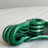 Antique green enamelled ceramic candle holder