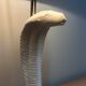 Vintage white ceramic cobra table lamp, 1970s. Attributed to Tommaso Barbi.