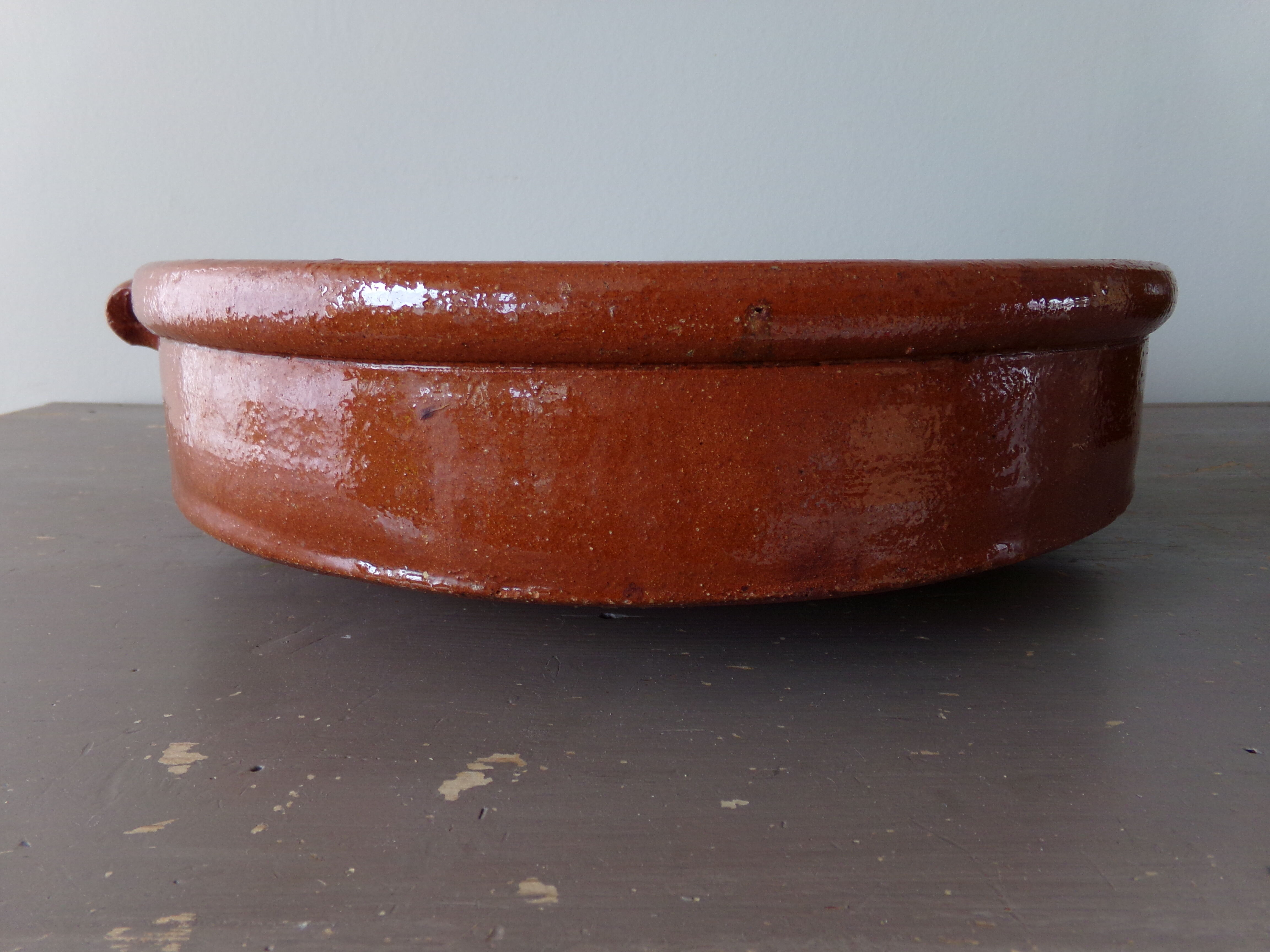 Antique dish in glazed terracotta