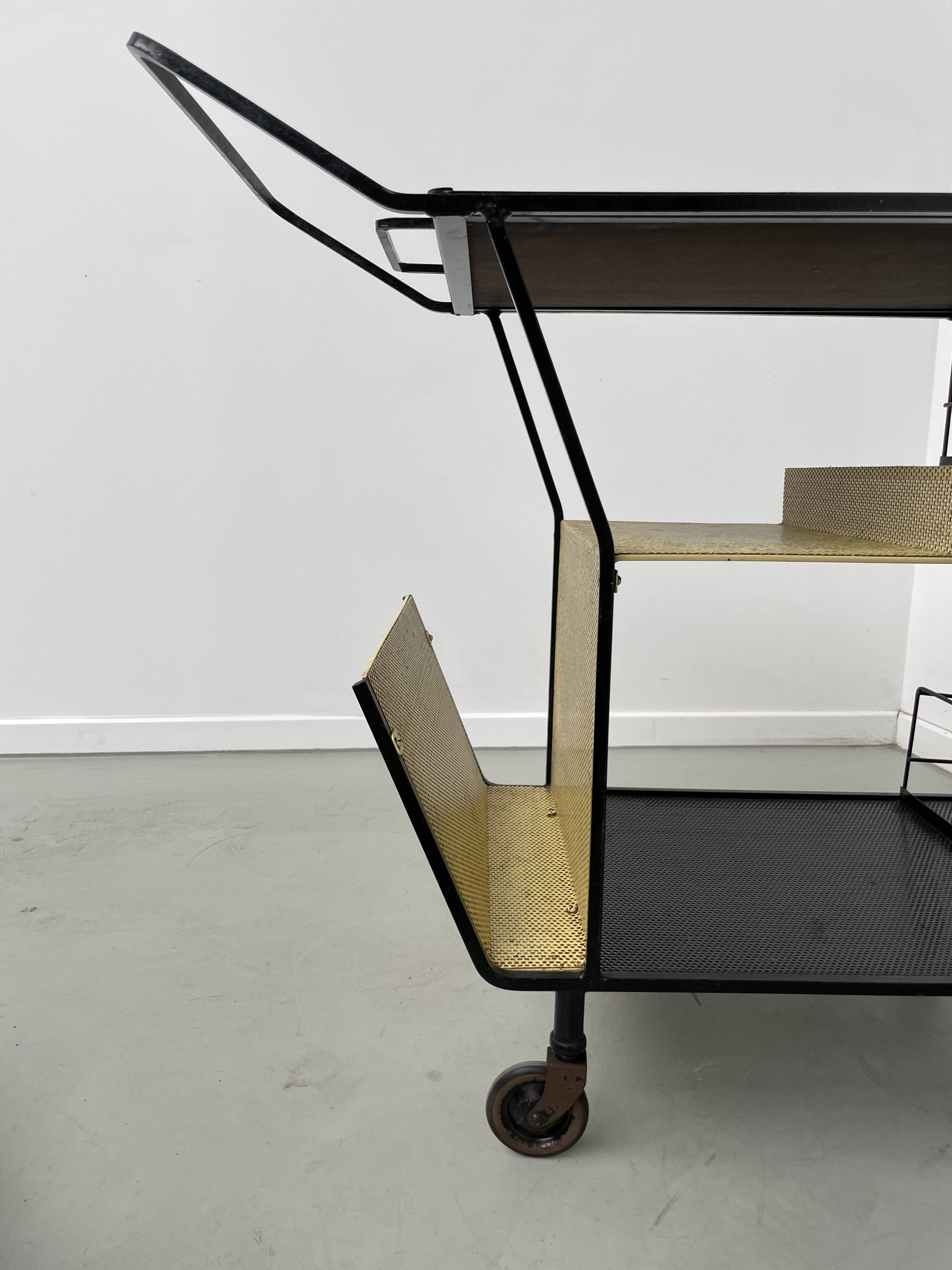 Perforated metal serving trolley in the Mathieu Matégot style