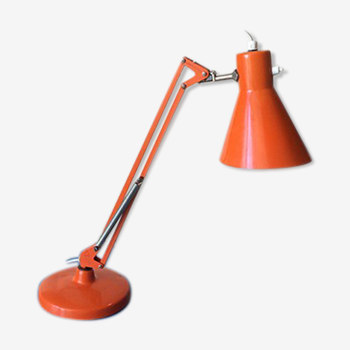 Luxo L9 orange single-arm lamp on plinth