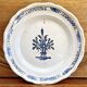 Old round hollow dish XVIII black bottom Rouen Forges les eaux