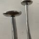 Trio of vintage cast aluminum candlesticks