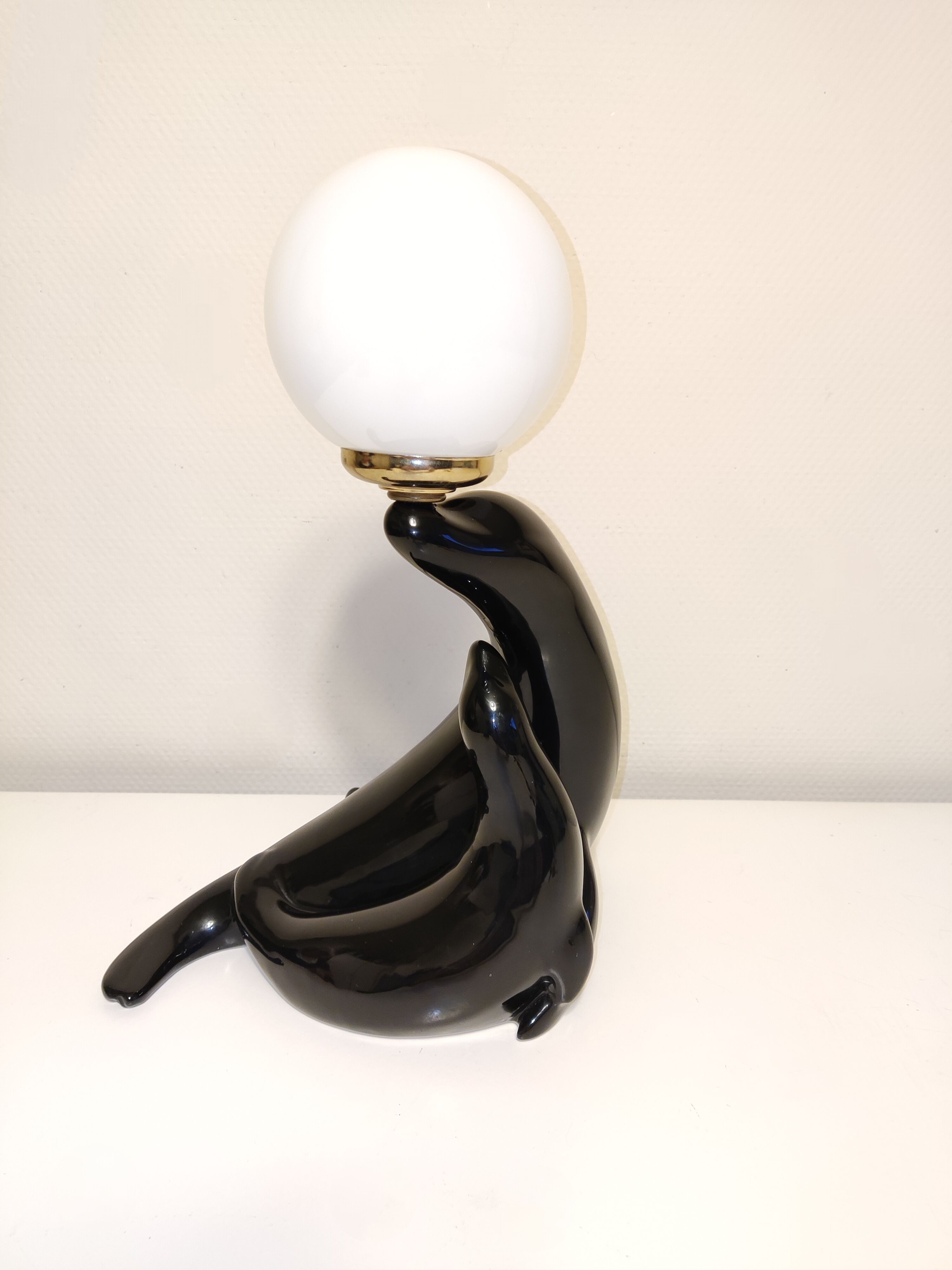 Sea lion lamp with its small ceramic