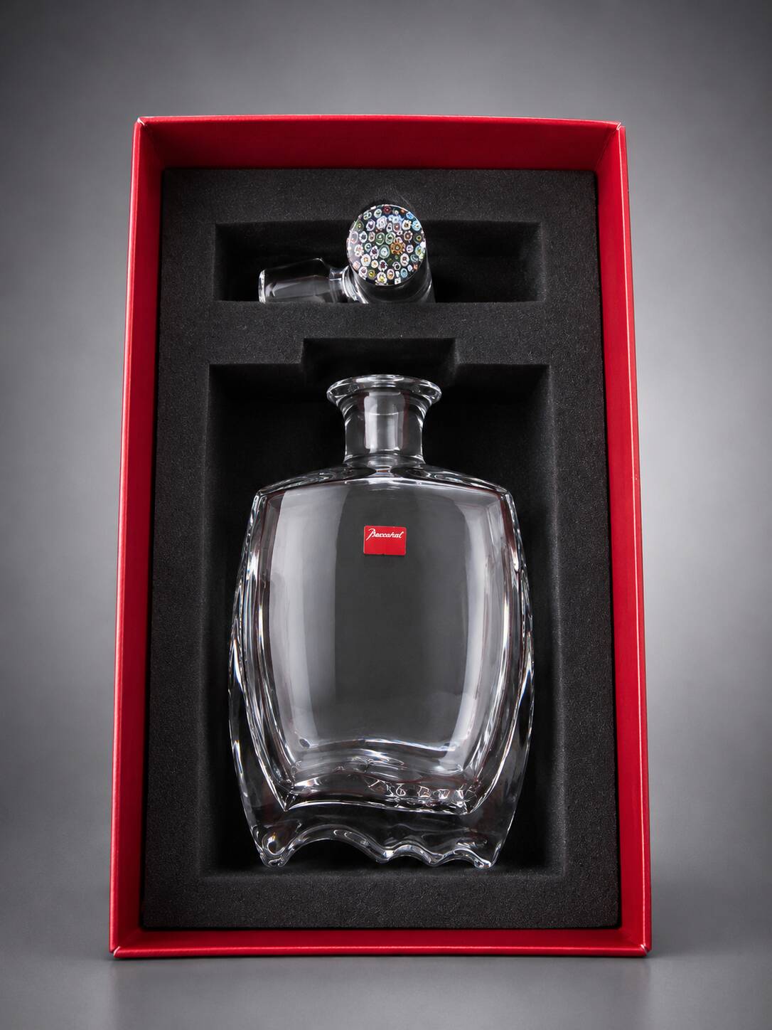 Baccarat crystal carafe with millefiori stopper and original box.
