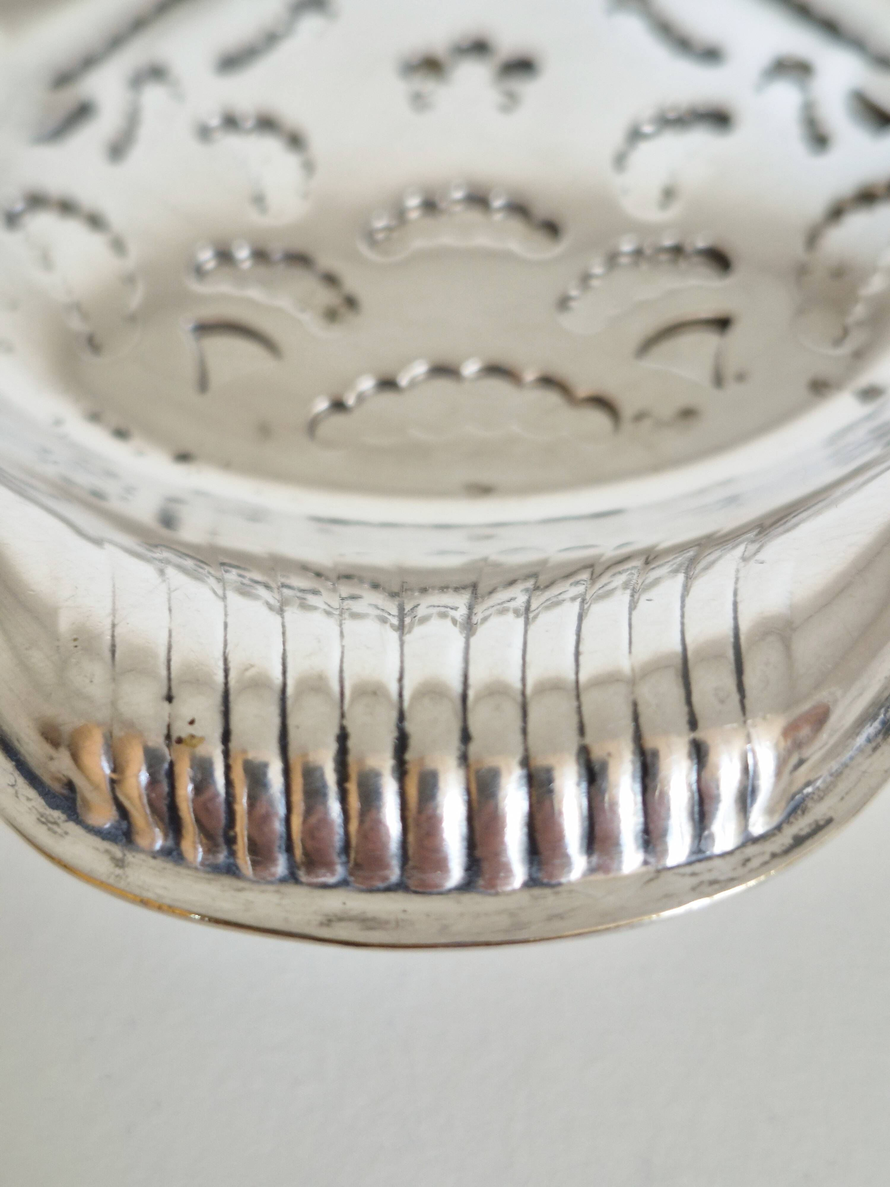 Silver scallop shell butter dish.
