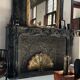 Vintage French brass fire screen, peacock design, 20th century.